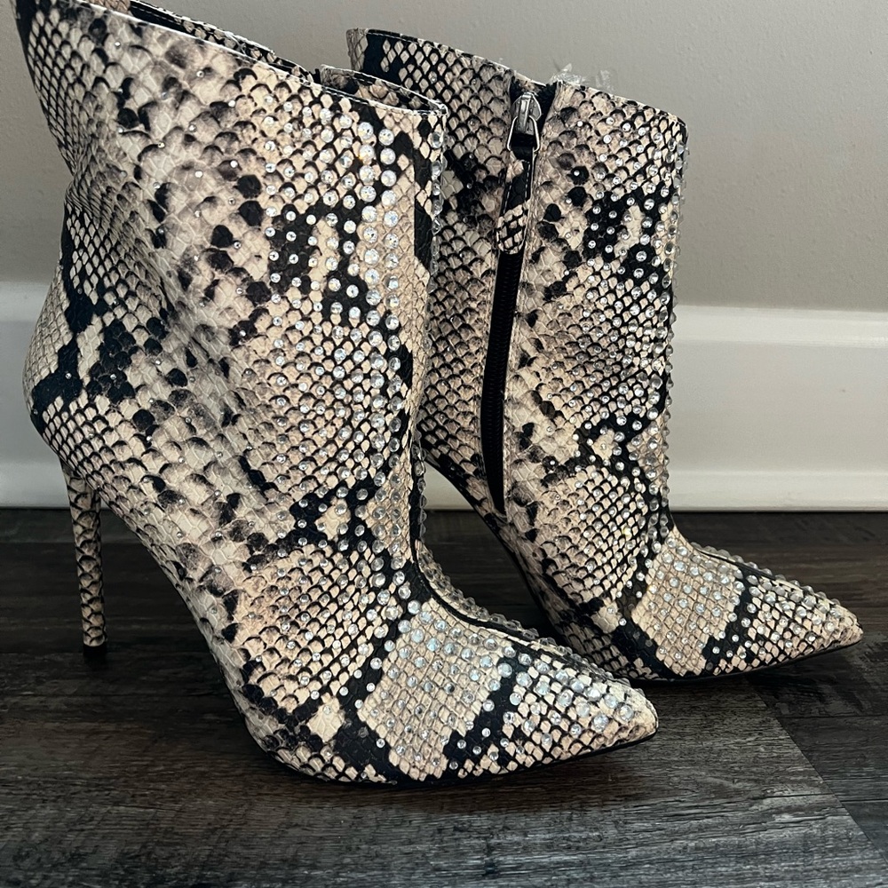 Jennifer Lopez Black and Cream Snakeskin Ankle Booties